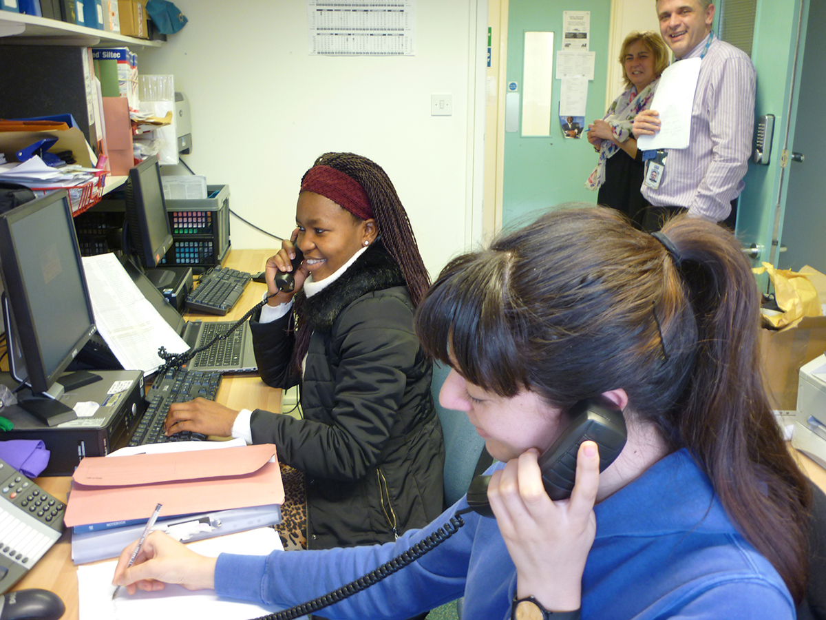 women answering phones