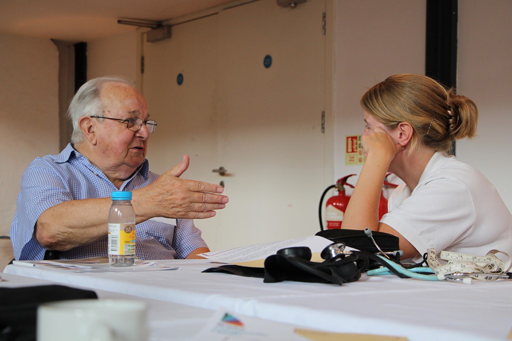 white man and nurse at event_large
